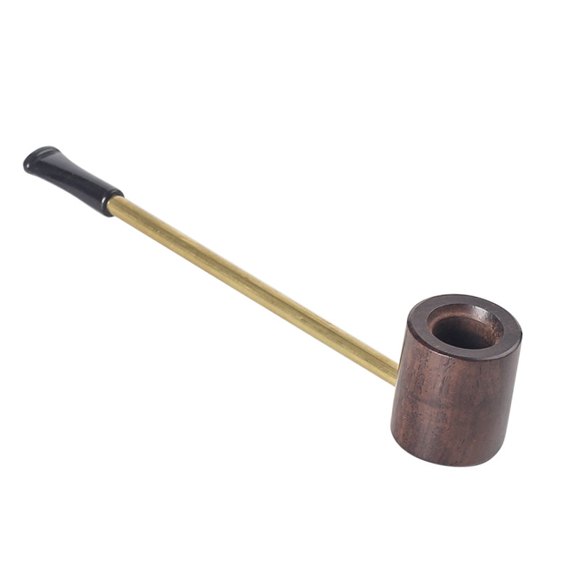 black wooden pipe with copper rod